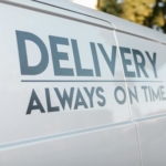 A Comprehensive Guide to Delivery Service in Nigeria Close-up of delivery van with slogan 'Always On Time' emphasizing timely service.